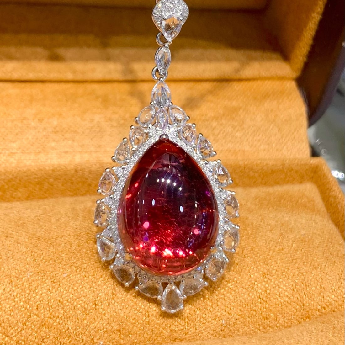 14k Gold 10.7 Ct Natural Tourmaline & Diamond & Sapphire Pendant( Without Chain ): Ref:231038167 // gold content:14k gold // main gemstone:tourmaline // shape:pear // carat weight:10. 7ct // color:red // treatment:natural // // adjacent gemstone 2 : diamond // shape:round //