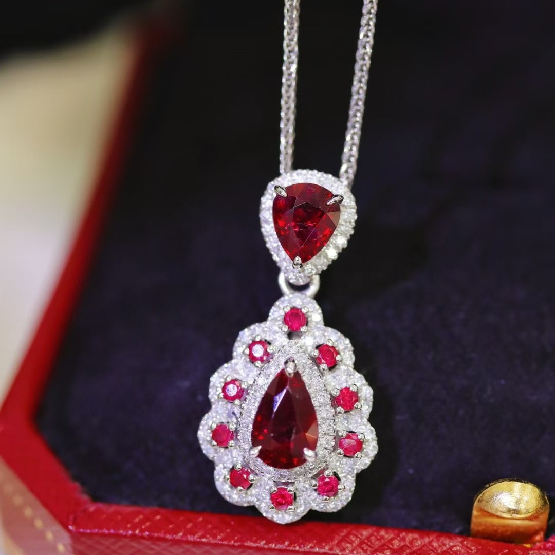 14k Gold 1.71 Ctw Natural Ruby & Diamond Pendant( Without Chain ): Ref:231038183 // gold content:14k gold // main gemstone:ruby // shape:pear // carat weight:1. 46ct // color:pigeonblood red // treatment:natural // // adjacent gemstone 2 : diamond // shape:round //