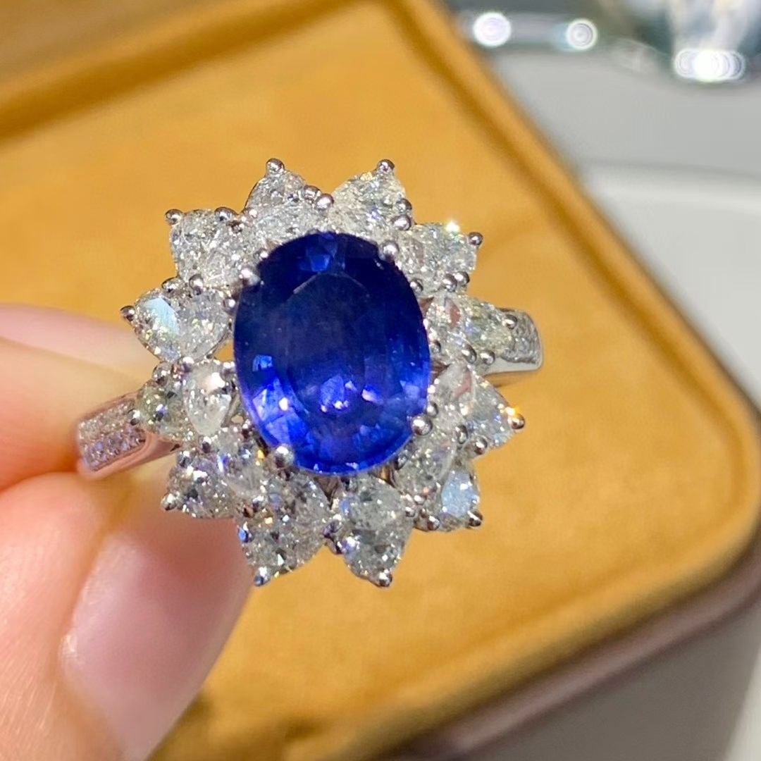 14k Gold 2.5 Ct Natural Sapphire & Diamond Ring: Ref:231038184 // gold content:14k gold // ring size:7. 25us // // main gemstone:sapphire // shape:oval // carat weight:2. 5ct // color:blue // treatment:natural // // adjacent gemstone 2 : diamond //