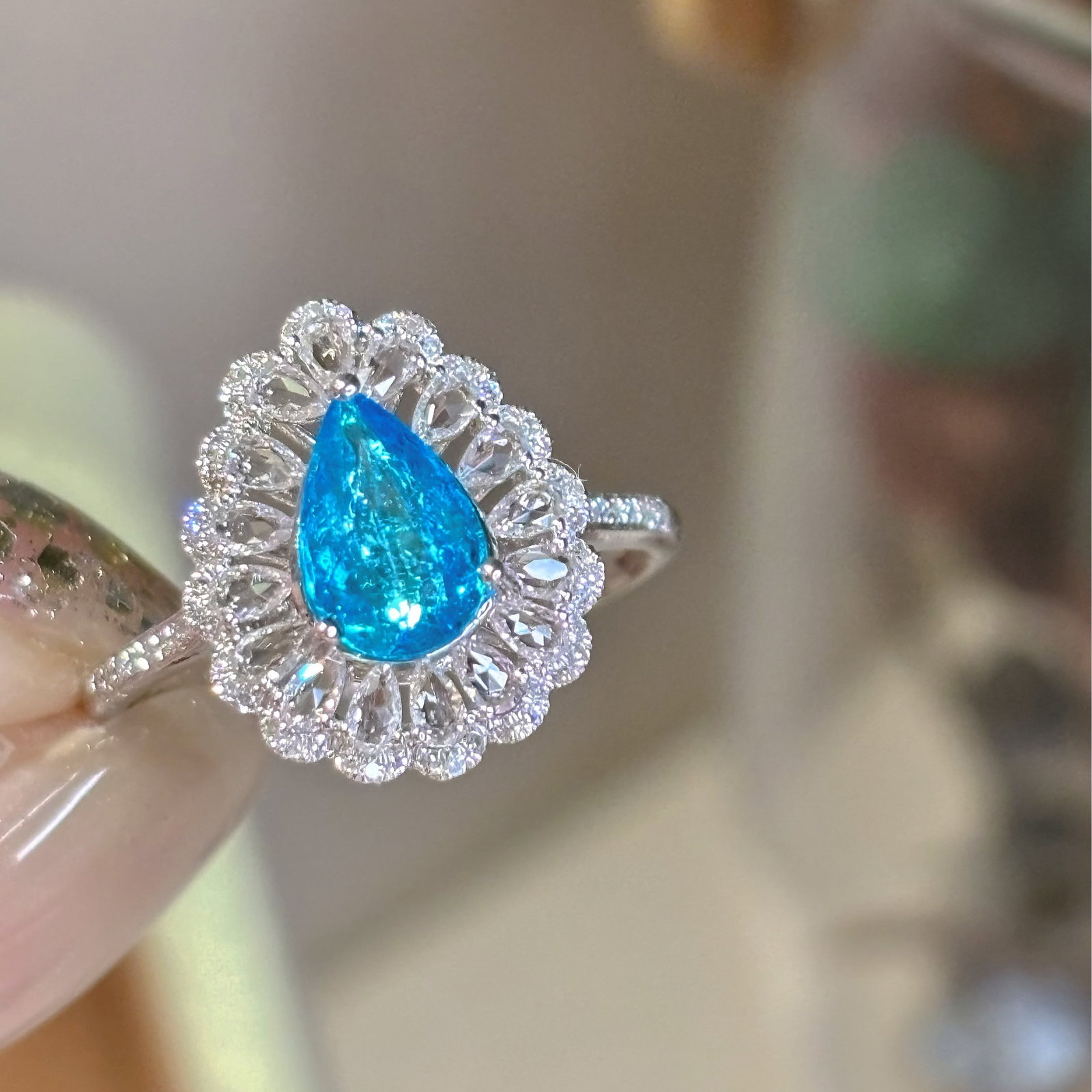 14k Gold 0.9 Ct Natural Paraiba Tourmaline & Diamond & Sapphire Ring: Ref:231038213 // gold content:14k gold // ring size:7. 25us // // main gemstone:paraiba tourmaline // shape:pear // carat weight:0. 9ct // color:blue // treatment:natural // // adjacent gemstone 2 :