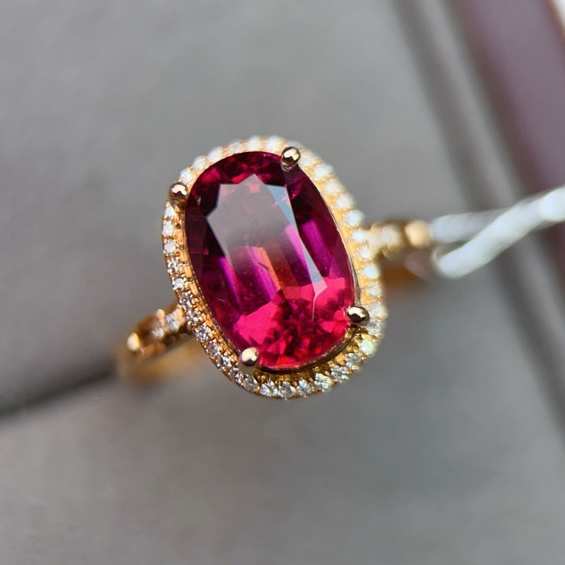 14k Gold 3.96 Ctw Natural Tourmaline & Diamond Ring: Ref:231038242 // gold content:14k gold // ring size:7. 25us // // main gemstone:tourmaline // shape:oval // carat weight:3. 85ct // color:red // treatment:natural // // adjacent gemstone 2 : diamond