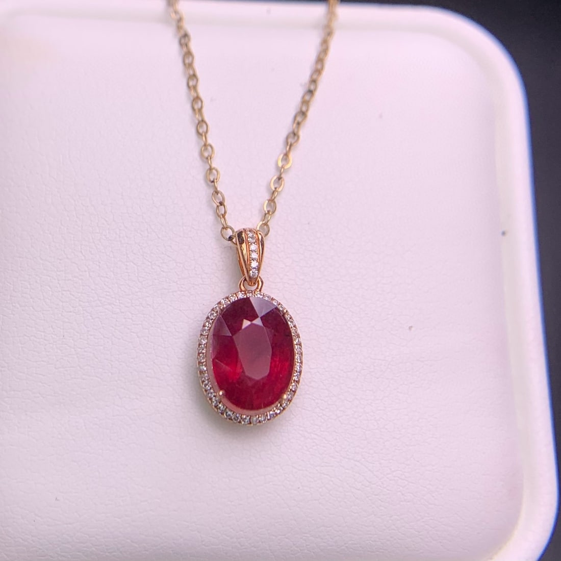 14k Gold 2.9 Ct Natural Tourmaline & Diamond Pendant( Without Chain ): Ref:231038243 // gold content:14k gold // main gemstone:tourmaline // shape:oval // carat weight:2. 9ct // color:red // treatment:natural // // adjacent gemstone 2 : diamond // shape:round // clarity