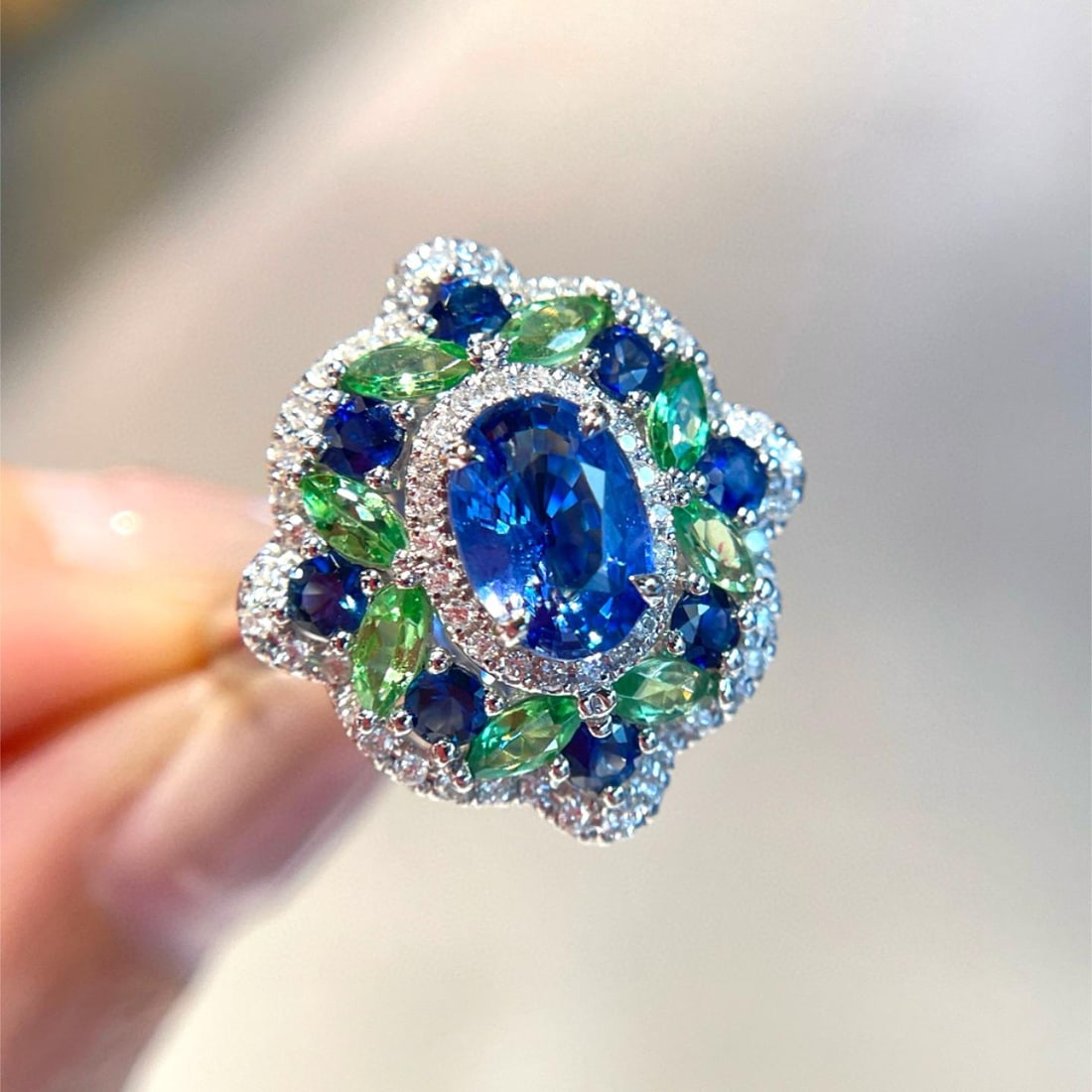 14k Gold 1.05 Ct Natural Sapphire & Diamond & Sapphire & Tsavorite Ring: Ref:231038268 // gold content:14k gold // ring size:7. 25us // // main gemstone:sapphire // shape:oval // carat weight:1. 05ct // color:blue // treatment:natural // // adjacent gemstone 2 : diamond //