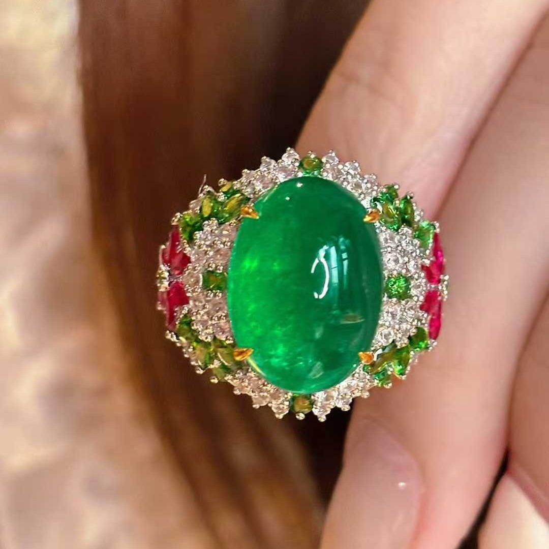 14k Gold 9 Ct Vivid Green Natural Emerald & Diamond Ring: Ref:231038331 // gold content:14k gold // ring size:7. 25us // // main gemstone:emerald // shape:oval // carat weight:9ct // color:vivid green // treatment:natural // // adjacent gemstone 2 : diamond