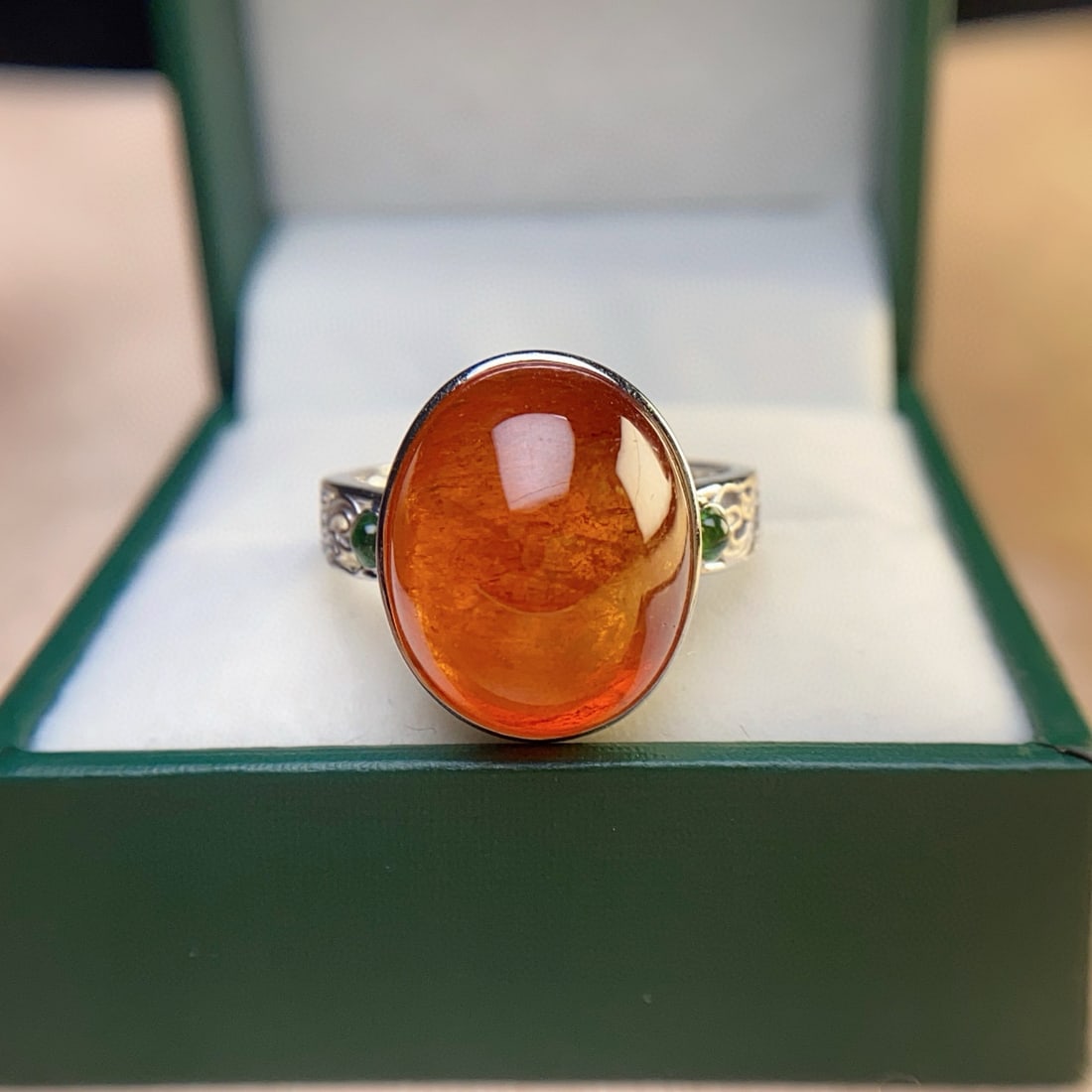 14k Gold 18.30 Ct Natural Spessartine & Tsavorite Ring: Ref:231038342 // gold content:14k gold // ring size:7. 25us // // main gemstone:spessartine // shape:oval // carat weight:18. 30ct // color:orange // treatment:natural // // adjacent gemstone 2 :