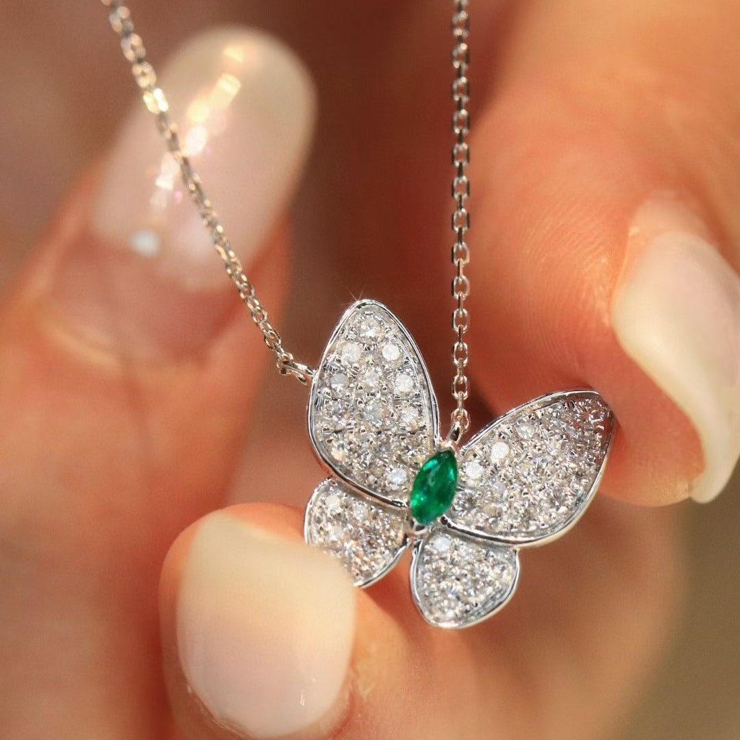 14k Gold 0.58 Ctw Vivid Green Natural Emerald & Diamond & Butterfly Necklace: Ref:231038357 // gold content:14k gold // main gemstone:emerald // shape:marquise // carat weight:0. 08ct // color:vivid green // treatment:natural // // adjacent gemstone 2 : diamond // shape:round