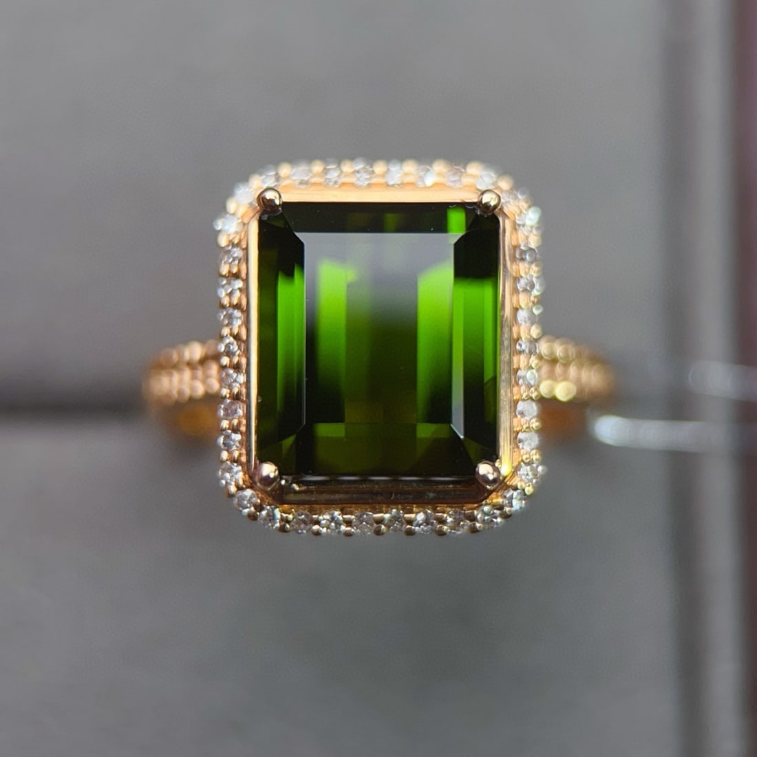 14k Gold 5.79 Ctw Natural Tourmaline & Diamond Ring: Ref:231038402 // gold content:14k gold // ring size:7. 25us // // main gemstone:tourmaline // shape:octagonal // carat weight:5. 6ct // color:green // treatment:natural // // adjacent gemstone 2 :
