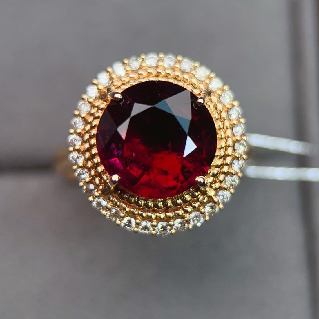 14k Gold 5.1 Ct Natural Tourmaline & Diamond Ring: Ref:231038403 // gold content:14k gold // ring size:7. 25us // // main gemstone:tourmaline // shape:round // carat weight:5. 1ct // color:red // treatment:natural // cut grade:g // // adjacent