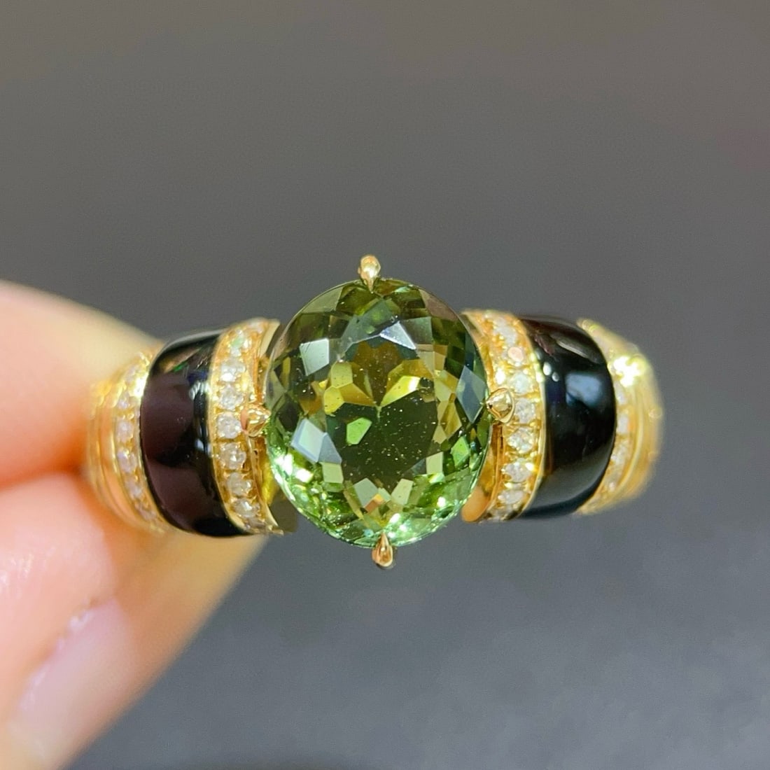 14k Gold 2.82 Ctw Natural Tourmaline & Diamond Ring: Ref:231038442 // gold content:14k gold // ring size:7. 25us // // main gemstone:tourmaline // shape:oval // carat weight:2. 60ct // color:green // treatment:natural // // adjacent gemstone 2 :