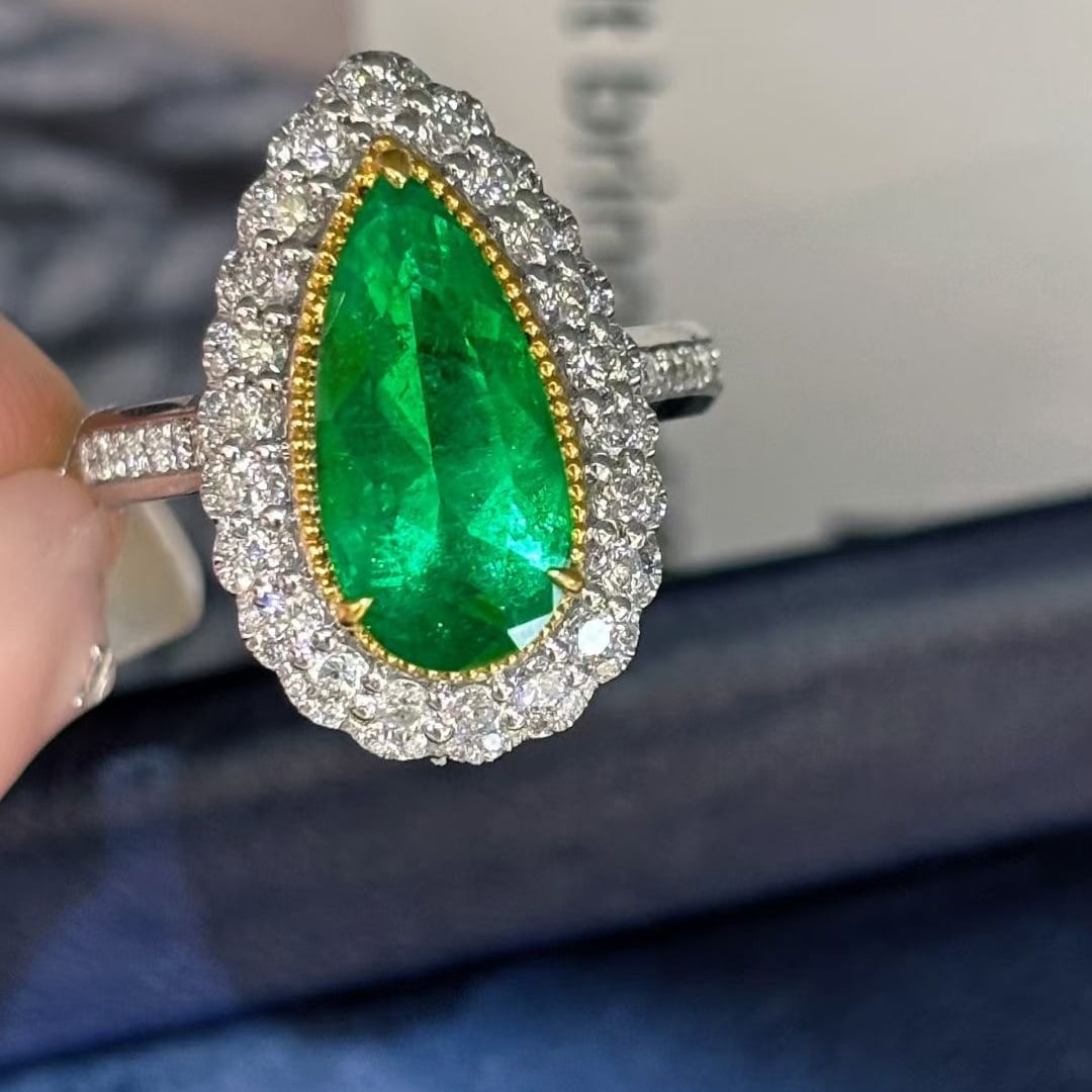 14k Gold 2.45 Ct Vivid Green Natural Emerald & Diamond Ring: Ref:231038450 // gold content:14k gold // ring size:7. 25us // // main gemstone:emerald // shape:pear // carat weight:2. 45ct // color:vivid green // treatment:natural // // adjacent gemstone 2 :