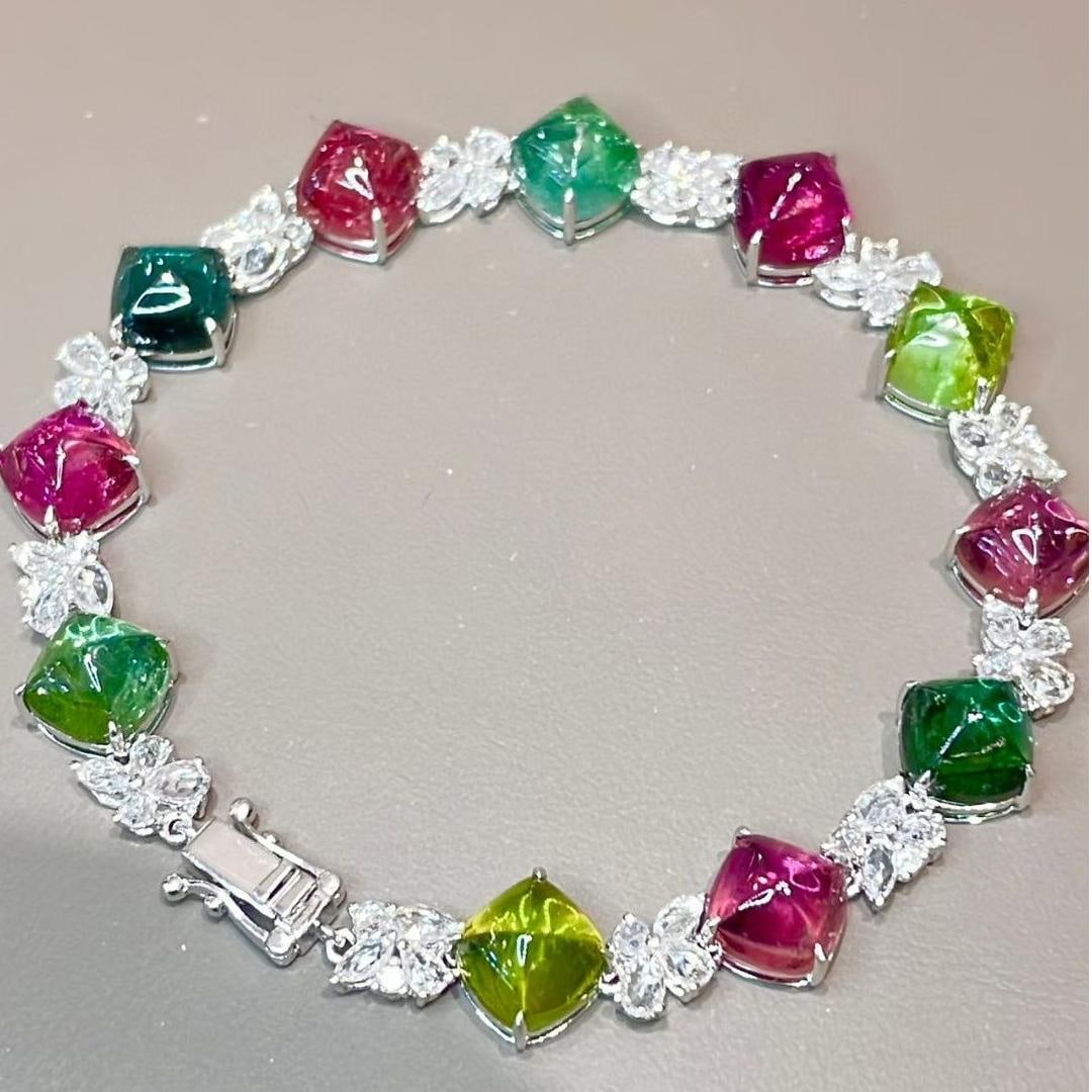 14k Gold 21 Ct Natural Tourmaline & Diamond & Sapphire Bracelet: Ref:231039016 // gold content:14k gold // main gemstone:tourmaline // shape:suger-loaf // carat weight:21ct // color:color // treatment:natural // // adjacent gemstone 2 : diamond // shape:round // cl