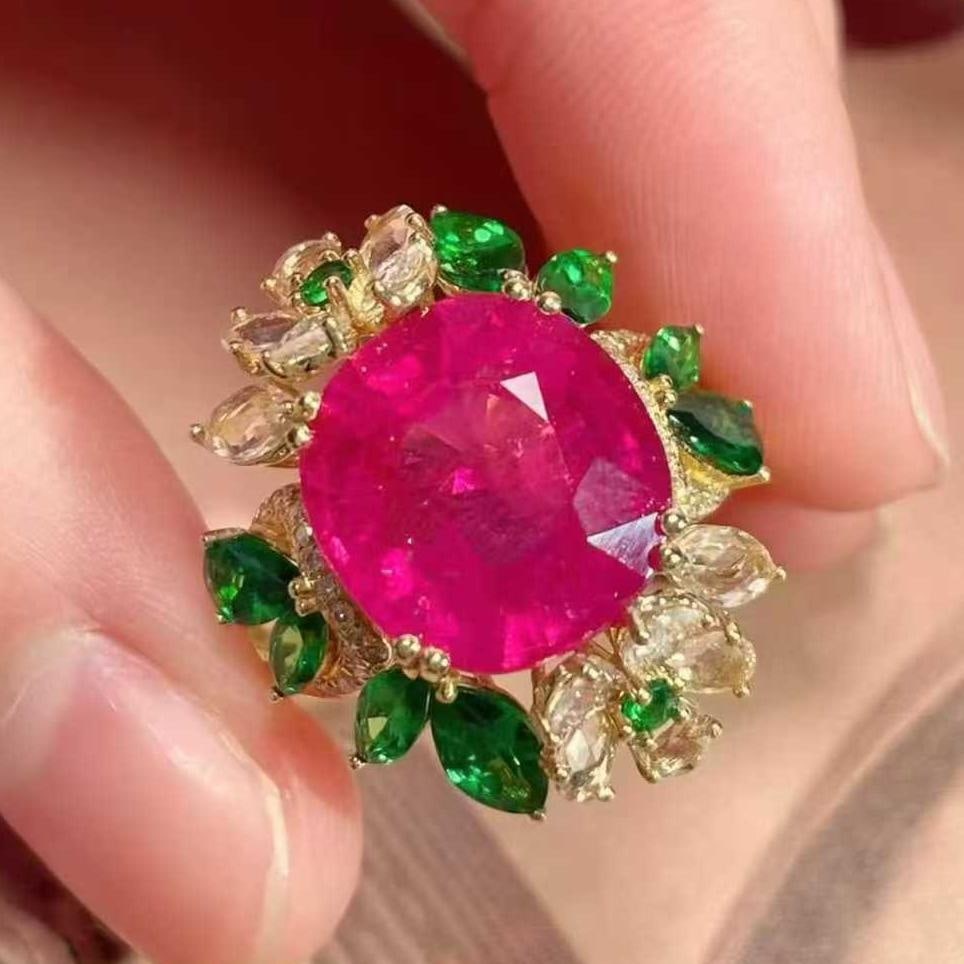 14k Gold 8.6 Ctw Natural Tourmaline & Diamond & Coloured Gemstone Ring: Ref:231039052 // gold content:14k gold // ring size:7. 25us // // main gemstone:tourmaline // shape:oval // carat weight:6ct // color:rubellite // treatment:natural // // adjacent gemstone 2 : diamond