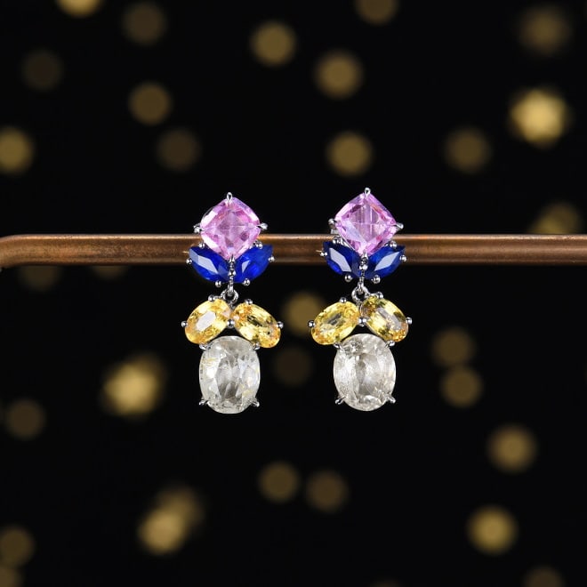 14k Gold 6.85 Ct Natural Sapphire Earrings: Ref:231039063 // gold content:14k gold // main gemstone:sapphire // shape:multiply // carat weight:6. 85ct // color:color // treatment:natural // Condition: New Low Estimate: 7900.00 High Estimate: