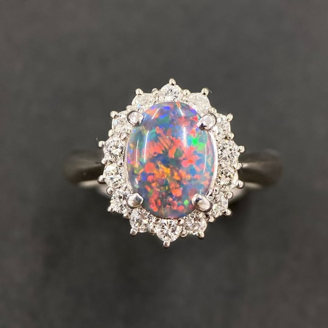 14k Gold 1.57 Ctw Natural Opal & Diamond Ring: Ref:231039085 // gold content:14k gold // ring size:7. 25us // // main gemstone:opal // shape:oval // carat weight:1. 14ct // color:color // treatment:natural // // adjacent gemstone 2 : diamond // sh