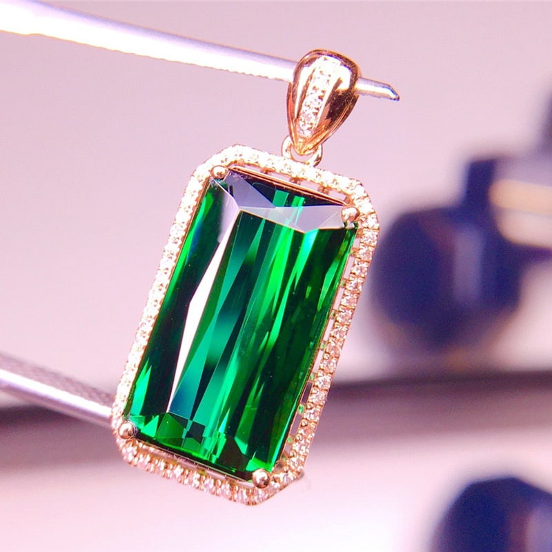 14k Gold 7.81 Ct Natural Tourmaline & Diamond Pendant( Without Chain ): Ref:231039089 // gold content:14k gold // main gemstone:tourmaline // shape:octagonal // carat weight:7. 81ct // color:green // treatment:natural // // adjacent gemstone 2 : diamond // shape:round // 