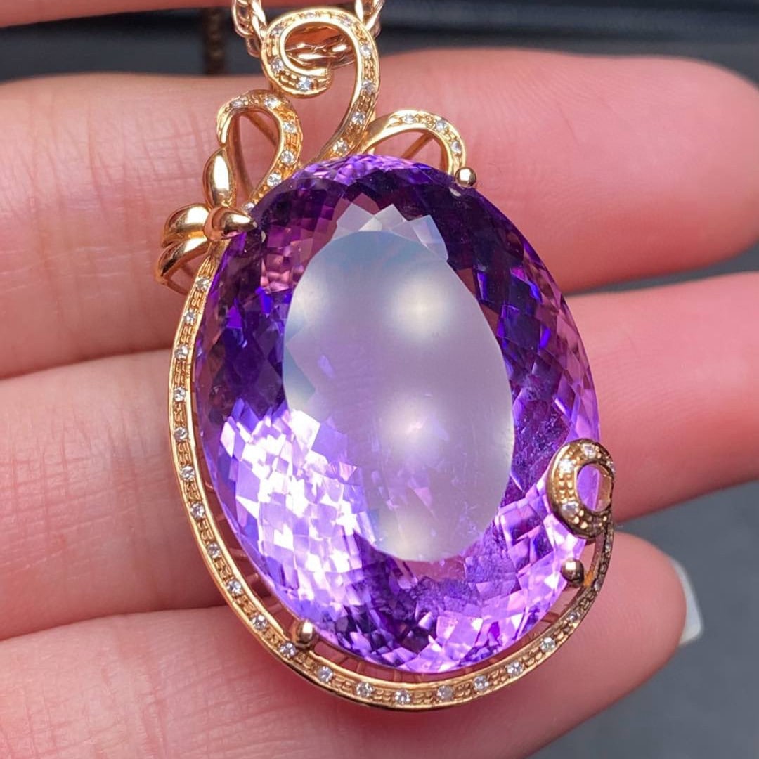 14k Gold 41.75 Ct Natural Amethyst & Diamond Pendant( Without Chain ): Ref:231039113 // gold content:14k gold // main gemstone:amethyst // shape:oval // carat weight:41. 75ct // color:purple // treatment:natural // // adjacent gemstone 2 : diamond // number of stones:45