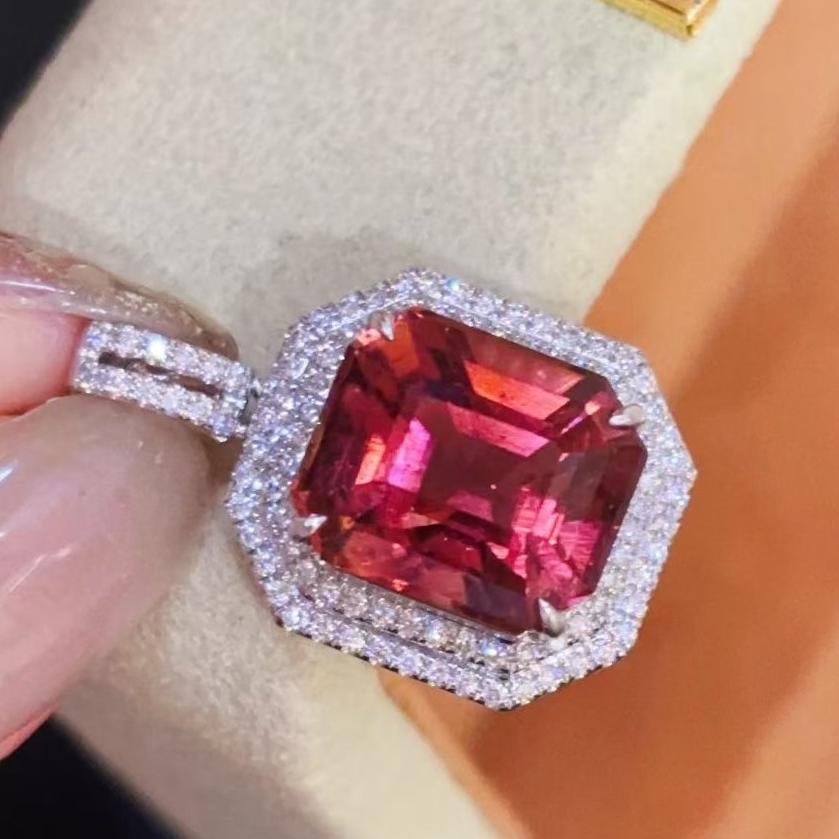 14k Gold 6.5 Ct Natural Tourmaline & Diamond Pendant( Without Chain ): Ref:231039130 // gold content:14k gold // main gemstone:tourmaline // shape:octagonal // carat weight:6. 5ct // color:orangish red // treatment:natural // // adjacent gemstone 2 : diamond //