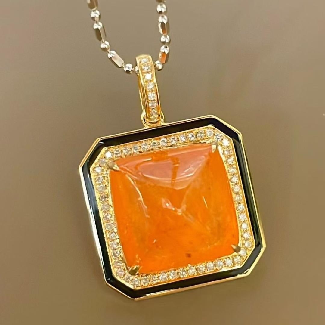 14k Gold 11.8 Ct Natural Spessartine & Diamond Pendant( Without Chain ): Ref:231039136 // gold content:14k gold // main gemstone:spessartine // shape:sugar-loaf // carat weight:11. 8ct // color:orange // treatment:natural // // adjacent gemstone 2 : diamond // shape:round