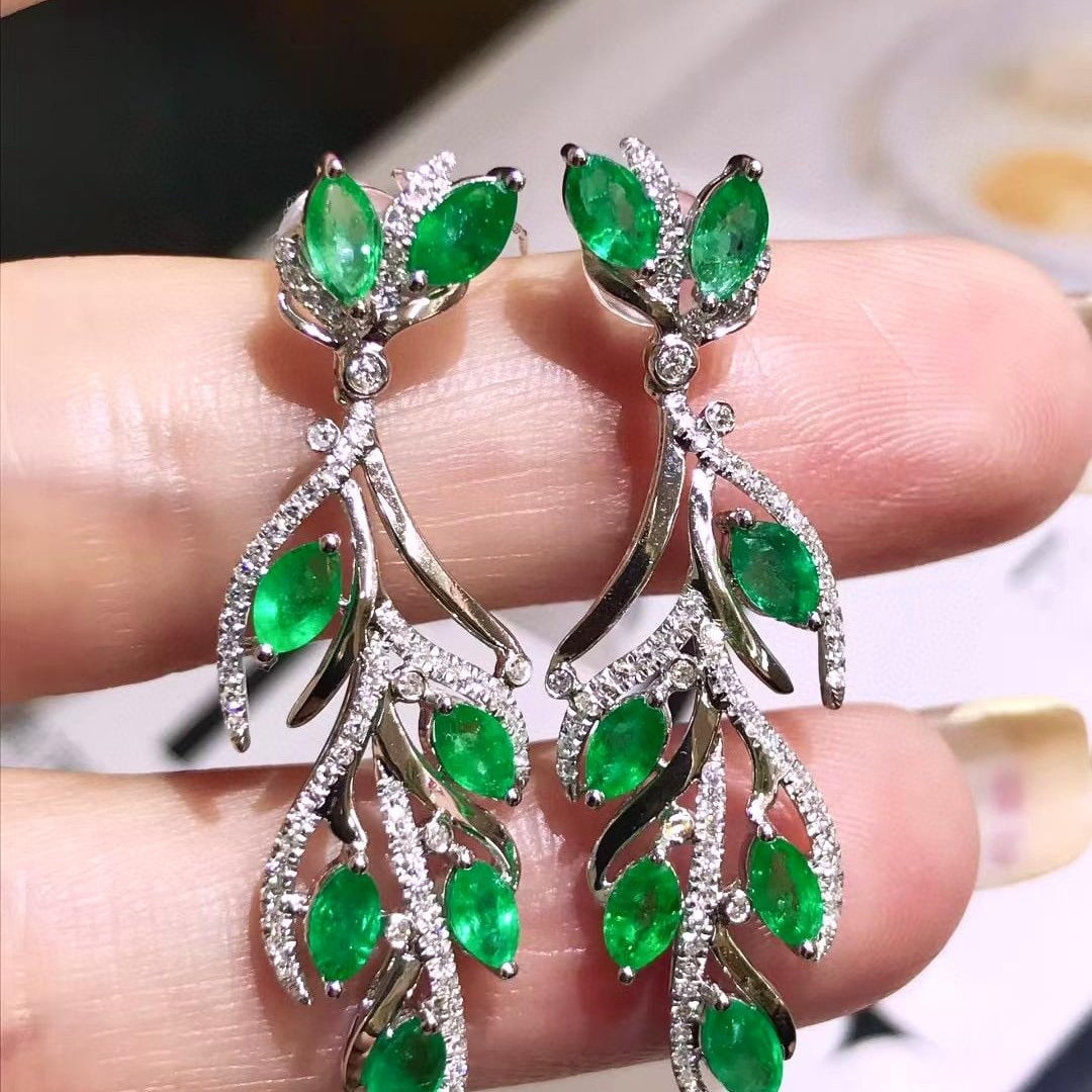 14k Gold 3.28 Ctw Natural Emerald & Diamond Earrings: Ref:231039138 // gold content:14k gold // main gemstone:emerald // shape:marquise // carat weight:2. 7ct // color:green // treatment:natural // // adjacent gemstone 2 : diamond // shape:round // carat