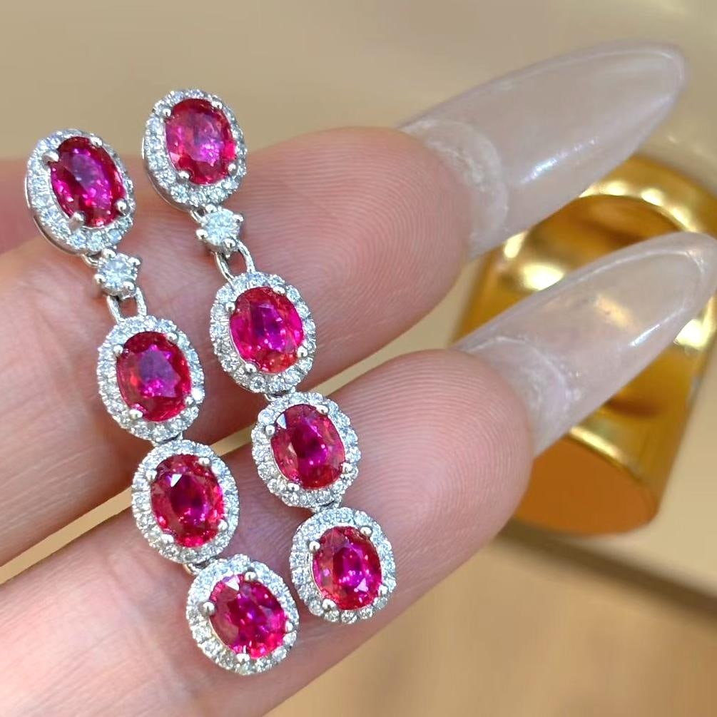 14k Gold 2.6 Ct Natural Ruby & Diamond Earrings: Ref:231039142 // gold content:14k gold // main gemstone:ruby // shape:oval // carat weight:2. 6ct // color:red // treatment:natural // // adjacent gemstone 2 : diamond // shape:round // clarity