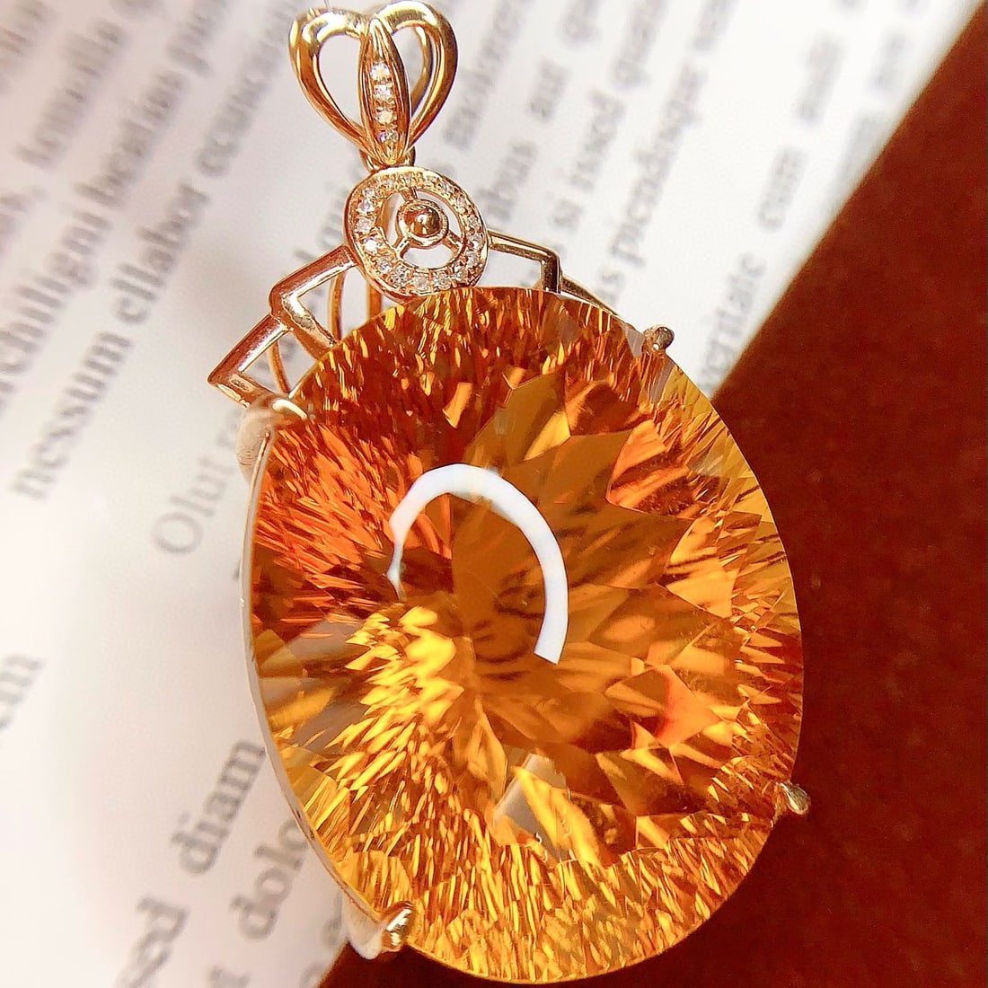 14k Gold 69.65 Ct Natural Citrine & Diamond Pendant( Without Chain ): Ref:231039183 // gold content:14k gold // main gemstone:citrine // shape:oval // carat weight:69. 65ct // color:yellow // treatment:natural // // adjacent gemstone 2 : diamond // number of stones:21