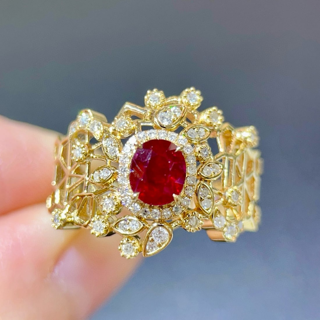 14k Gold 1.02 Ctw Natural Ruby & Diamond Ring: Ref:231039191 // gold content:14k gold // ring size:7. 25us // // main gemstone:ruby // shape:oval // carat weight:0. 78ct // color:red // treatment:natural // // adjacent gemstone 2 : diamond // shap
