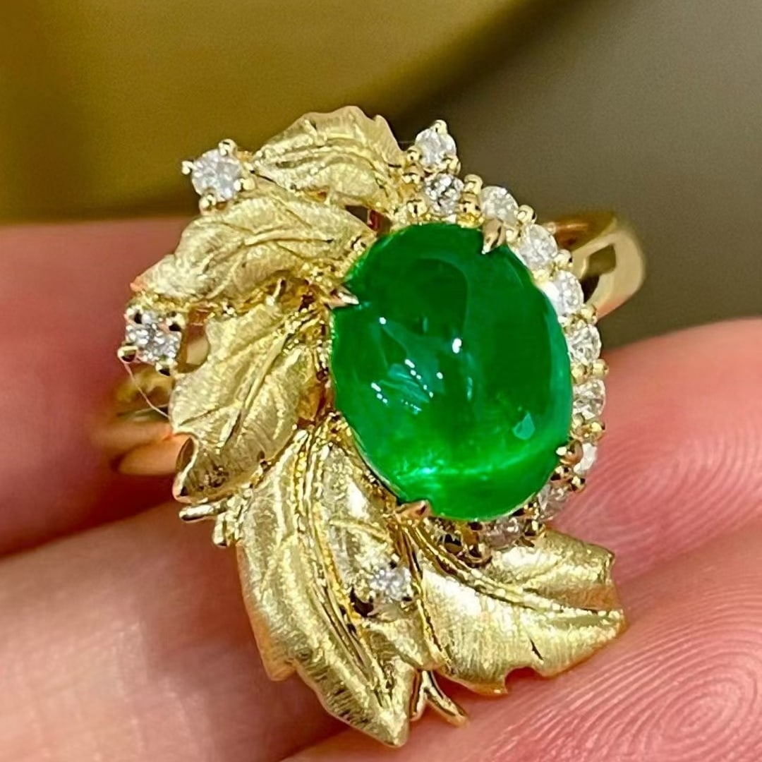 14k Gold 2.1 Ct Natural Emerald & Diamond Ring: Ref:231039194 // gold content:14k gold // ring size:7. 25us // // main gemstone:emerald // shape:oval // carat weight:2. 1ct // color:green // treatment:natural // // adjacent gemstone 2 : diamond //