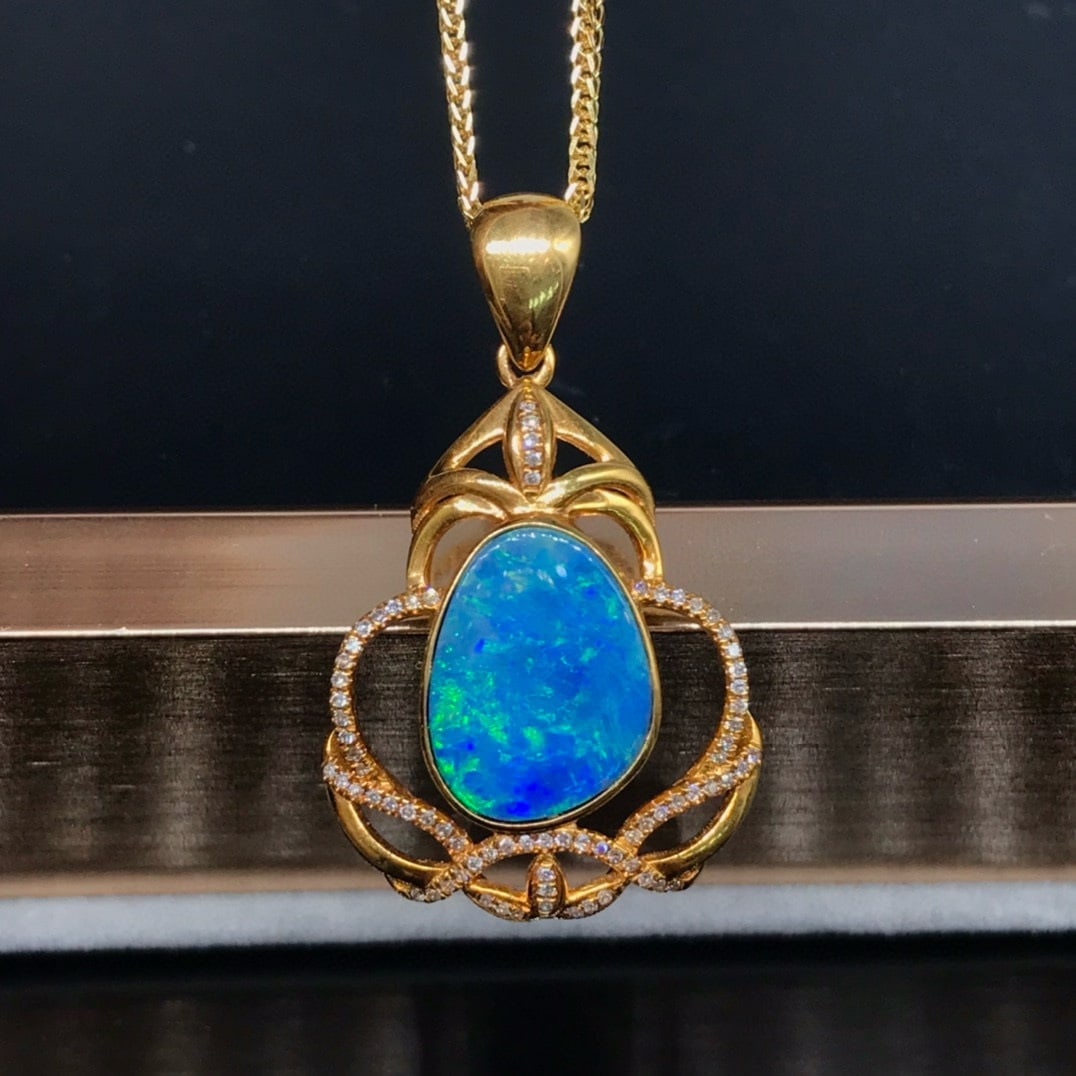 14k Gold 2.88 Ct Natural Opal & Diamond Pendant( Without Chain ): Ref:231039195 // gold content:14k gold // main gemstone:opal // shape:other // carat weight:2. 88ct // color:color // treatment:natural // // adjacent gemstone 2 : diamond // number of stones:75 //
