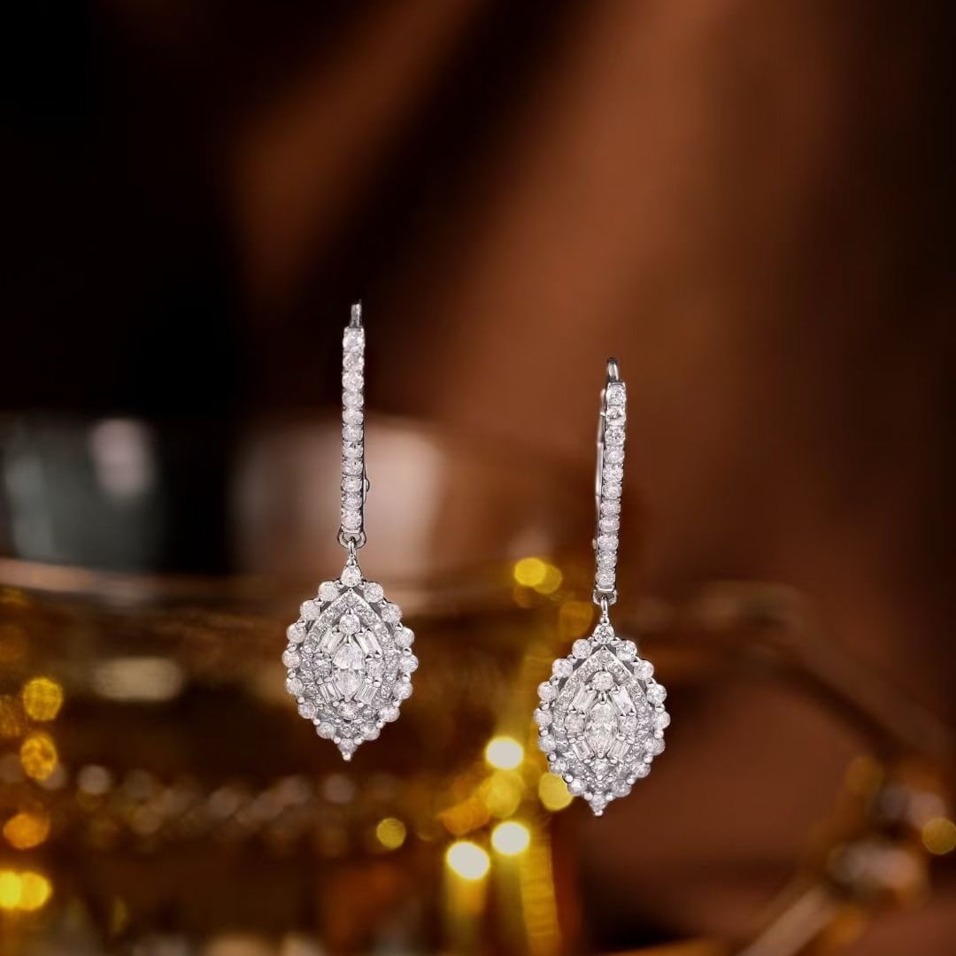 14k Gold 1.28 Ct Natural H Diamond Earrings: Ref:231039201 // gold content:14k gold // main gemstone:diamond // shape:multiply // carat weight:1. 28ct // clarity grade:vs-si // color:h // treatment:natural // Condition: New Low Estimate: