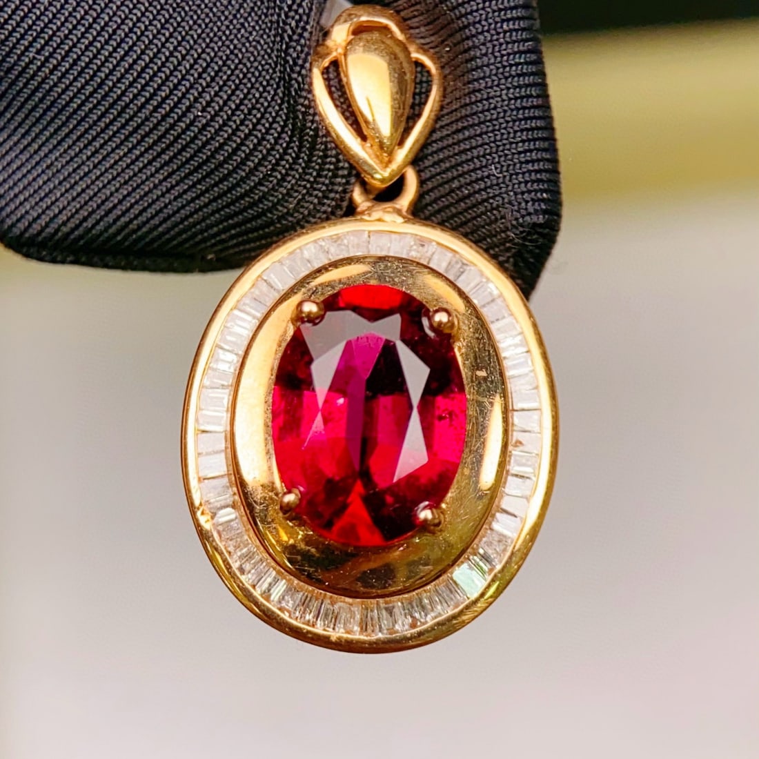 14k Gold 1.88 Ctw Natural Tourmaline & Diamond Pendant( Without Chain ): Ref:231039215 // gold content:14k gold // main gemstone:tourmaline // shape:oval // carat weight:1. 6ct // color:red // treatment:natural // // adjacent gemstone 2 : diamond // number of stones:56 //