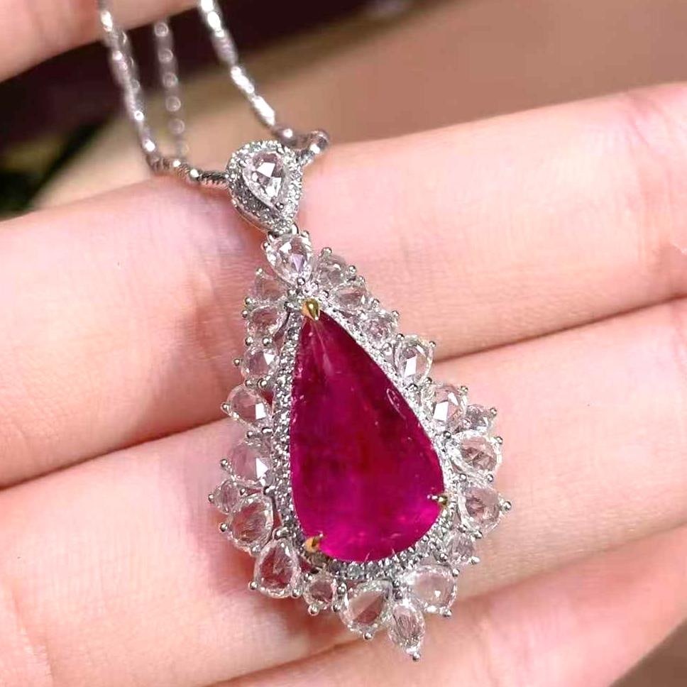 14k Gold 5.4 Ctw Natural Tourmaline & Diamond & Sapphire Pendant( Without Chain ): Ref:231039225 // gold content:14k gold // main gemstone:tourmaline // shape:pear // carat weight:3. 6ct // color:rubellite // treatment:natural // // adjacent gemstone 2 : diamond // number of