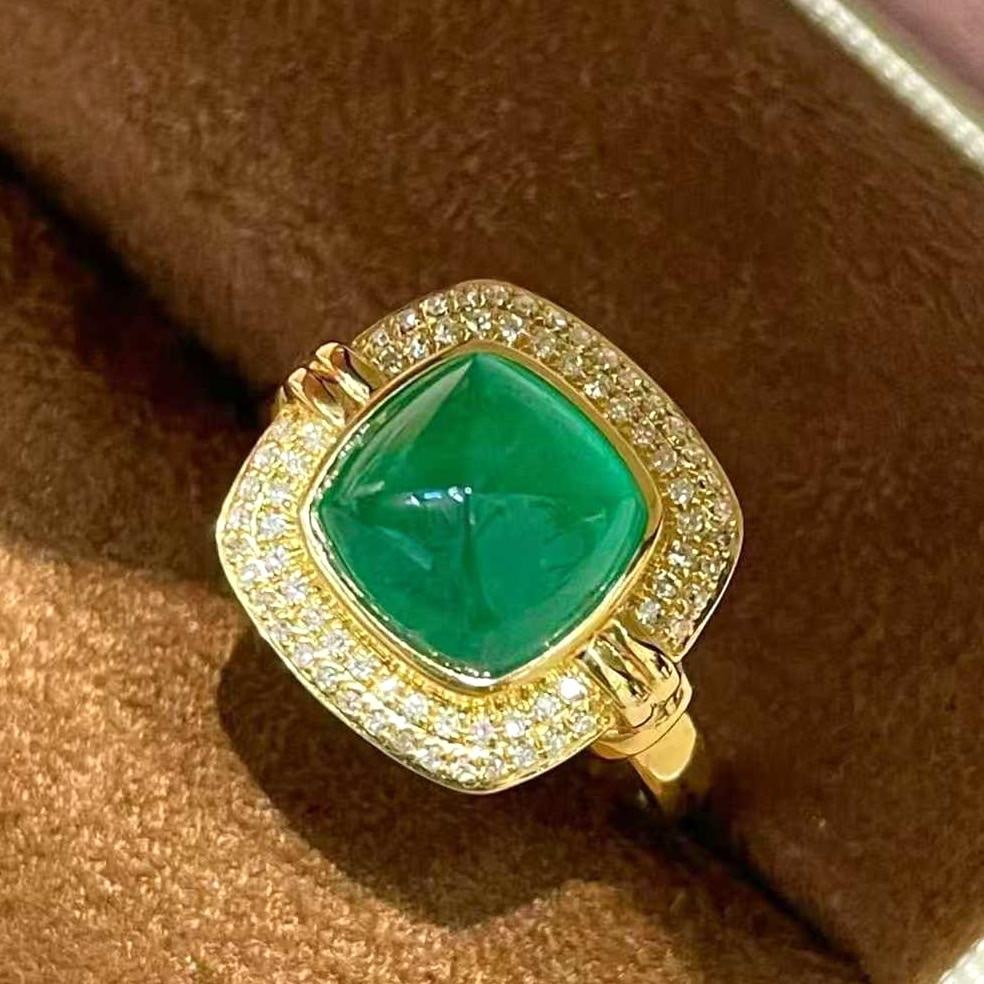 14k Gold 3.15 Ct Natural Emerald & Diamond Ring: Ref:231039231 // gold content:14k gold // ring size:7. 25us // // main gemstone:emerald // shape:sugar-loaf // carat weight:3. 15ct // color:green // treatment:natural // // adjacent gemstone 2 :