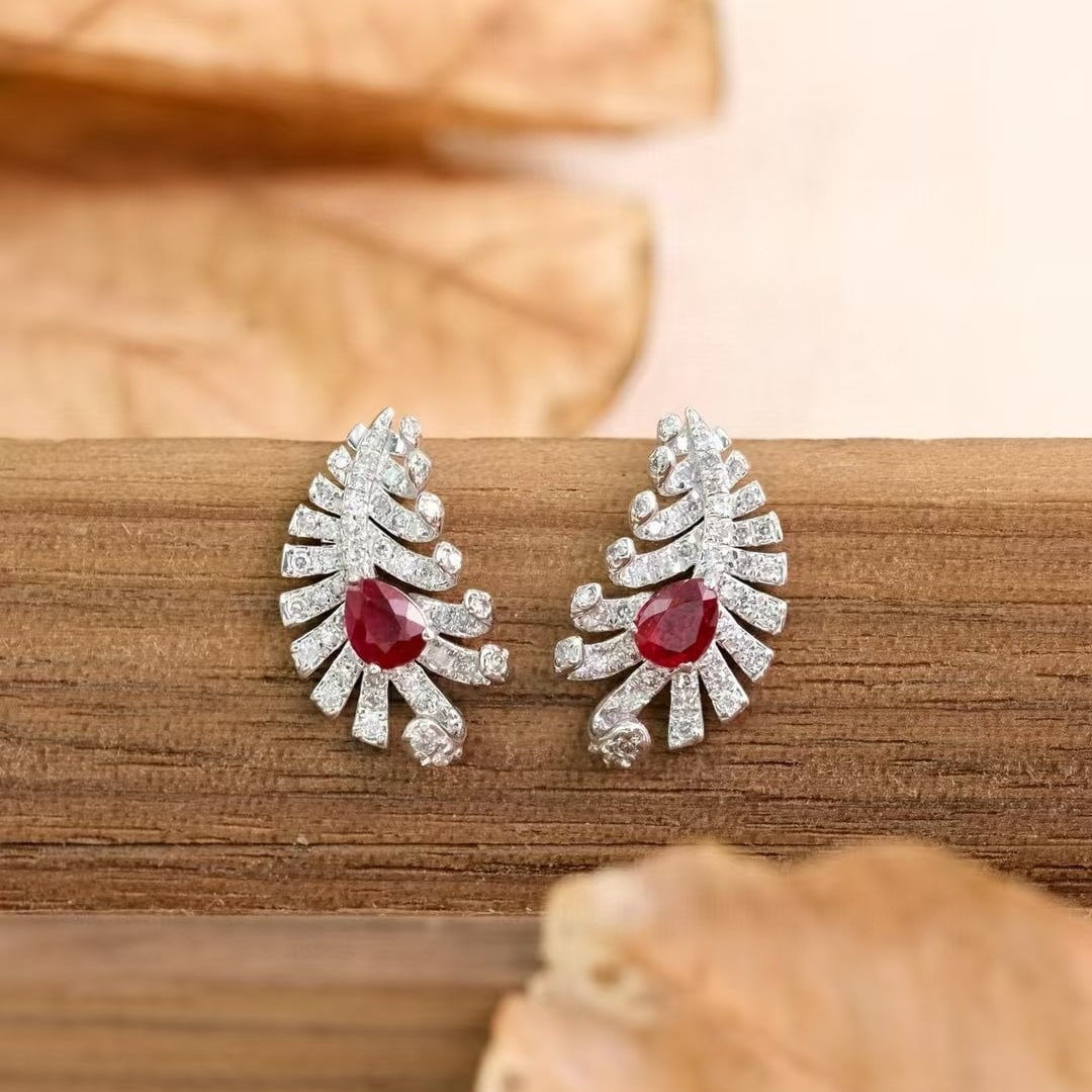 14k Gold 1 Ct Natural Ruby & Diamond Earrings: Ref:231039232 // gold content:14k gold // main gemstone:ruby // shape:pear // carat weight:1ct // color:red // treatment:natural // // adjacent gemstone 2 : diamond // shape:round // clarity