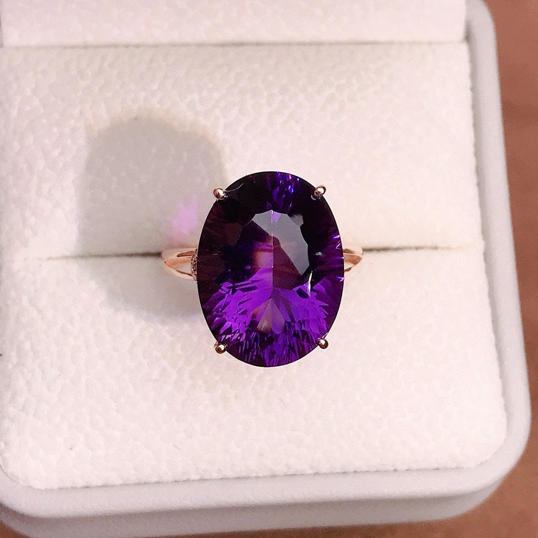 14k Gold 9.89 Ctw Natural Amethyst & Diamond Ring: Ref:231039248 // gold content:14k gold // ring size:7. 25us // // main gemstone:amethyst // shape:oval // carat weight:9. 85ct // color:purple // treatment:natural // // adjacent gemstone 2 : diamond