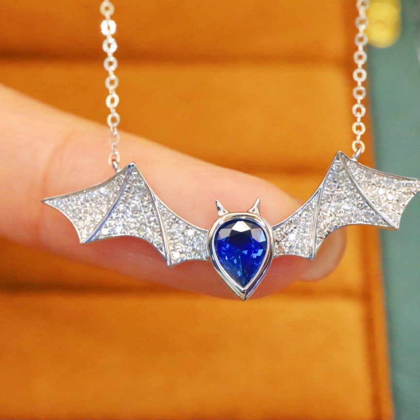 14k Gold 1.04 Ctw Natural Sapphire & Diamond Necklace: Ref:231040006 // gold content:14k gold // main gemstone:sapphire // shape:pear // carat weight:0. 75ct // color:royal blue // treatment:natural // // adjacent gemstone 2 : diamond // number of
