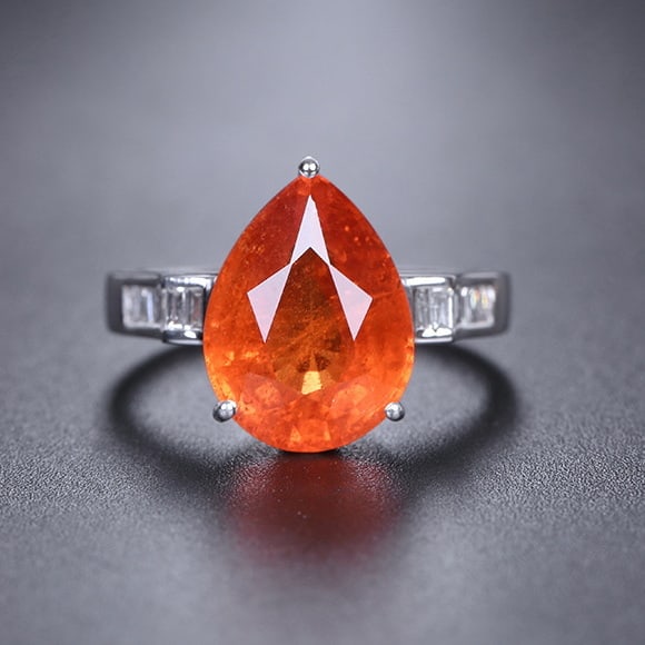 14k Gold 7.44 Ctw Natural Spessartine & Diamond Ring: Ref:231040022 // gold content:14k gold // ring size:7. 25us // // main gemstone:spessartine // shape:pear // carat weight:7. 2ct // color:orange // treatment:natural // // adjacent gemstone 2 :