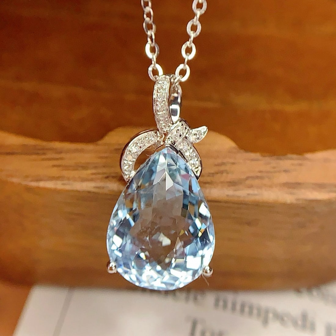14k Gold 3.88 Ct Natural Aquamarine & Diamond Pendant( Without Chain ): Ref:231040028 // gold content:14k gold // main gemstone:aquamarine // shape:pear // carat weight:3. 88ct // color:blue // treatment:natural // // adjacent gemstone 2 : diamond // number of stones:18 /