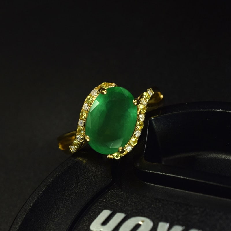 14k Gold 2.59 Ctw Natural Emerald & Diamond Ring: Ref:231040038 // gold content:14k gold // ring size:7. 25us // // main gemstone:emerald // shape:oval // carat weight:2. 51ct // color:green // treatment:natural // // adjacent gemstone 2 : diamond
