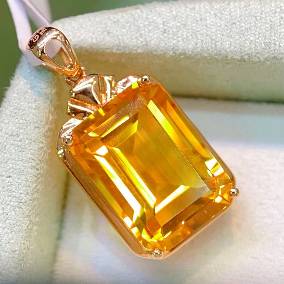 14k Gold 7.7 Ct Natural Citrine Pendant( Without Chain ): Ref:231040067 // gold content:14k gold // main gemstone:citrine // shape:octagonal // carat weight:7. 7ct // color:yellow // treatment:natural // Low Estimate: 1500 Condition: New High Estimate: 2300