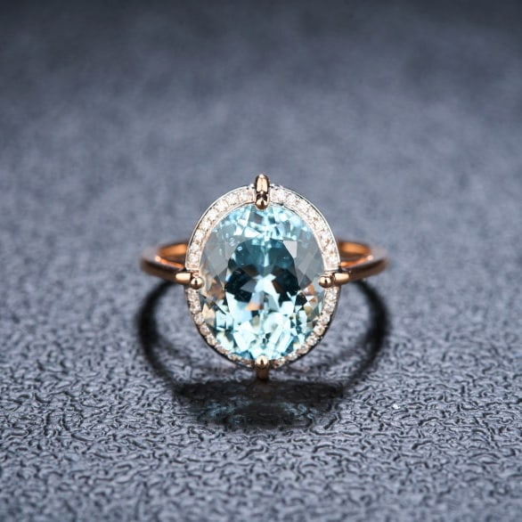 14k Gold 5.0 Ct Natural Aquamarine & Diamond Ring: Ref:231040074 // gold content:14k gold // ring size:7. 25us // // main gemstone:aquamarine // shape:oval // carat weight:5. 0ct // color:santa maria color // treatment:natural // // adjacent gemstone 