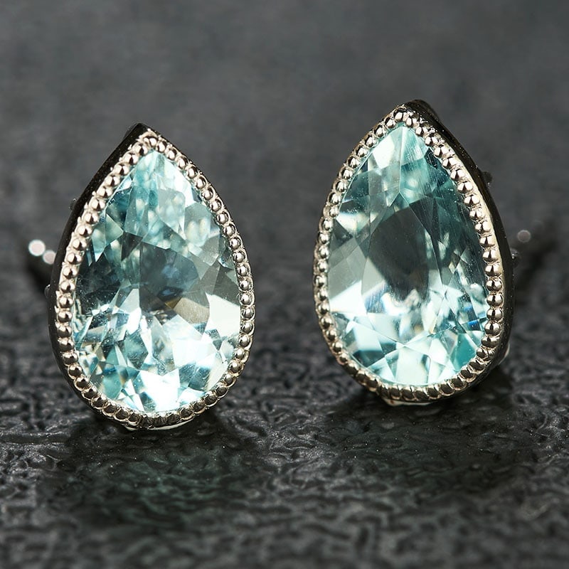 14k Gold 2.53 Ct Natural Aquamarine Earrings: Ref:231040077 // gold content:14k gold // main gemstone:aquamarine // shape:pear // carat weight:2. 53ct // color:blue // treatment:natural // Condition: New High Estimate: 2500 Low Estimate: 1700