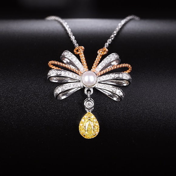 14k Gold 0.43 Ctw Natural Yellow Diamond & Diamond Necklace: Ref:231040111 // gold content:14k gold // main gemstone:yellow diamond // shape:pear // carat weight:0. 23ct // color:yellow // treatment:natural // // adjacent gemstone 2 : diamond // shape:round //