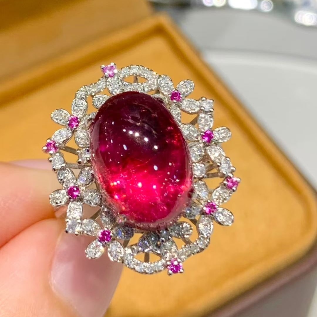 14k Gold 7.3 Ct Natural Tourmaline & Diamond Ring: Ref:231040121 // gold content:14k gold // ring size:7. 25us // // main gemstone:tourmaline // shape:oval // carat weight:7. 3ct // color:red // treatment:natural // // adjacent gemstone 2 : diamond