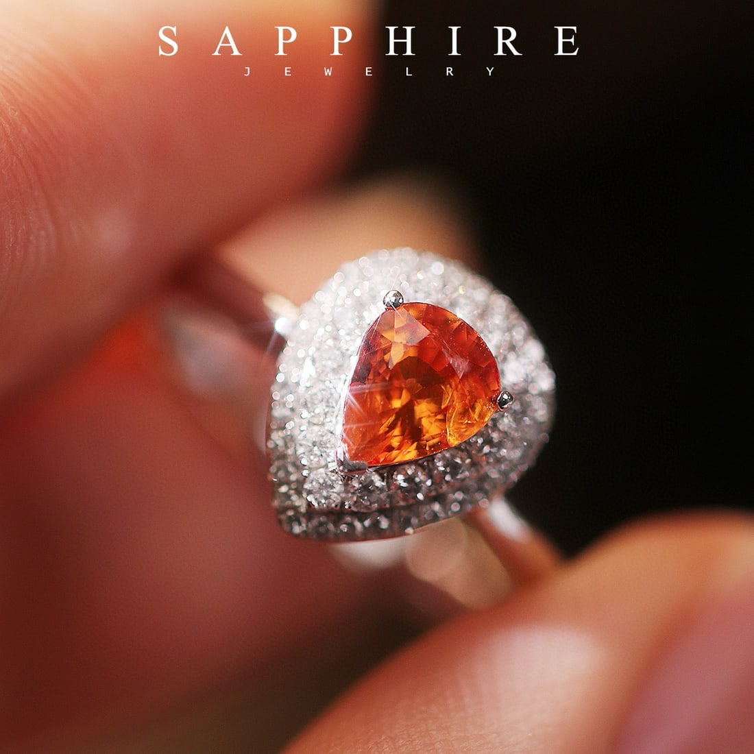 14k Gold 0.94 Ctw Natural Sapphire & Diamond Ring: Ref:231040137 // gold content:14k gold // ring size:7. 25us // // main gemstone:sapphire // shape:pear // carat weight:0. 7ct // color:orange // treatment:natural // // adjacent gemstone 2 : diamond