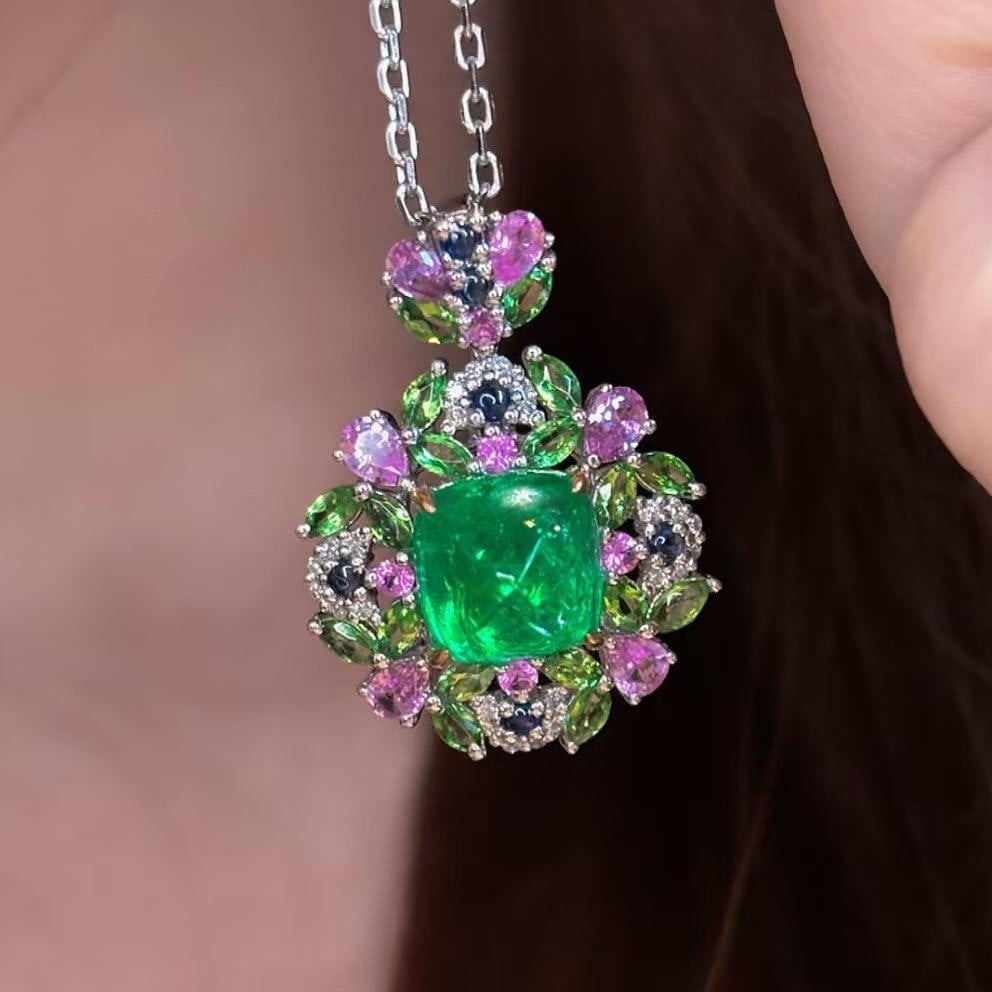 14k Gold 2.5 Ct Vivid Green Natural Emerald & Diamond & Sapphire & Tsavorite Pendant( Without Chain: Ref:231040139 // gold content:14k gold // main gemstone:emerald // shape:suger-loaf // carat weight:2. 5ct // color:vivid green // treatment:natural // // adjacent gemstone 2 : diamond // shape:round