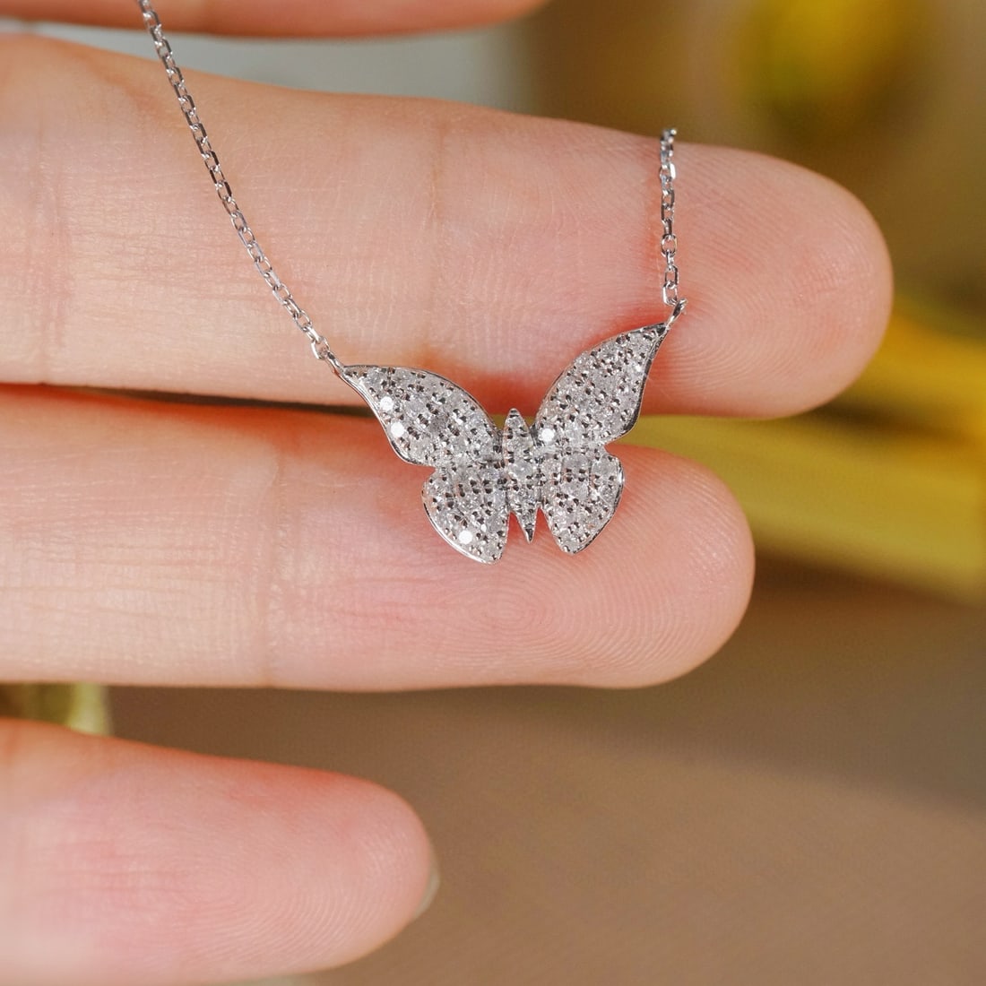 14k Gold 0.38 Ct Natural H Diamond & Butterfly Necklace: Ref:231040152 // gold content:14k gold // main gemstone:diamond // shape:round // carat weight:0. 38ct // clarity grade:vs-si // color:h // treatment:natural // cut grade:g // Low Estimate: 1500