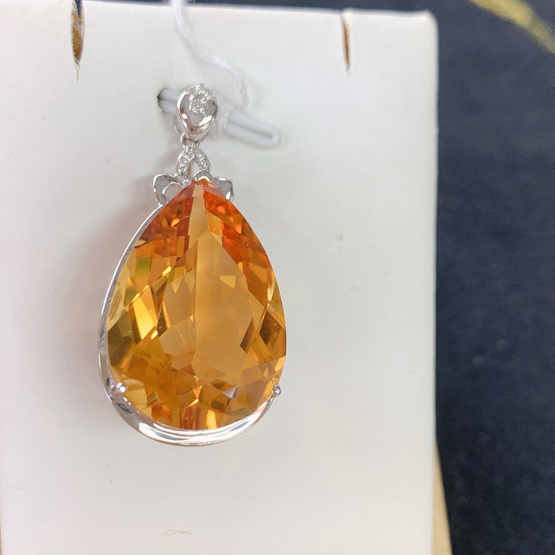 14k Gold 24.02 Ctw Natural Citrine & Diamond Pendant( Without Chain ): Ref:231040159 // gold content:14k gold // main gemstone:citrine // shape:pear // carat weight:23. 97ct // color:yellow // treatment:natural // // adjacent gemstone 2 : diamond // number of stones:9