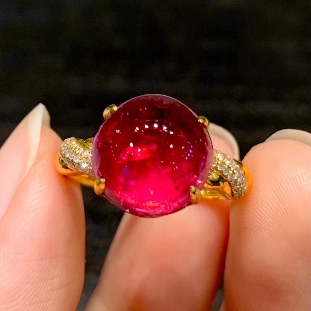 14k Gold 6.1 Ct Natural Tourmaline & Diamond Ring: Ref:231040182 // gold content:14k gold // ring size:7. 25us // // main gemstone:tourmaline // shape:round // carat weight:6. 1ct // color:red // treatment:natural // cut grade:g // // adjacent