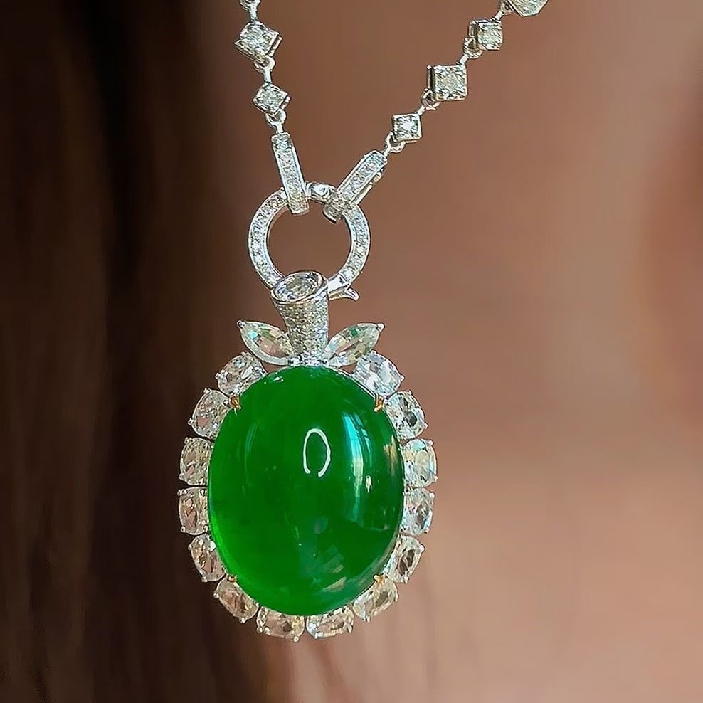 14k Gold 15.7 Ct Vivid Green Natural Emerald & Sapphire & Diamond Pendant( Without Chain ): Ref:231040215 // gold content:14k gold // main gemstone:emerald // shape:oval // carat weight:15. 7ct // color:vivid green // treatment:natural // // adjacent gemstone 2 : sapphire // shape:multiply