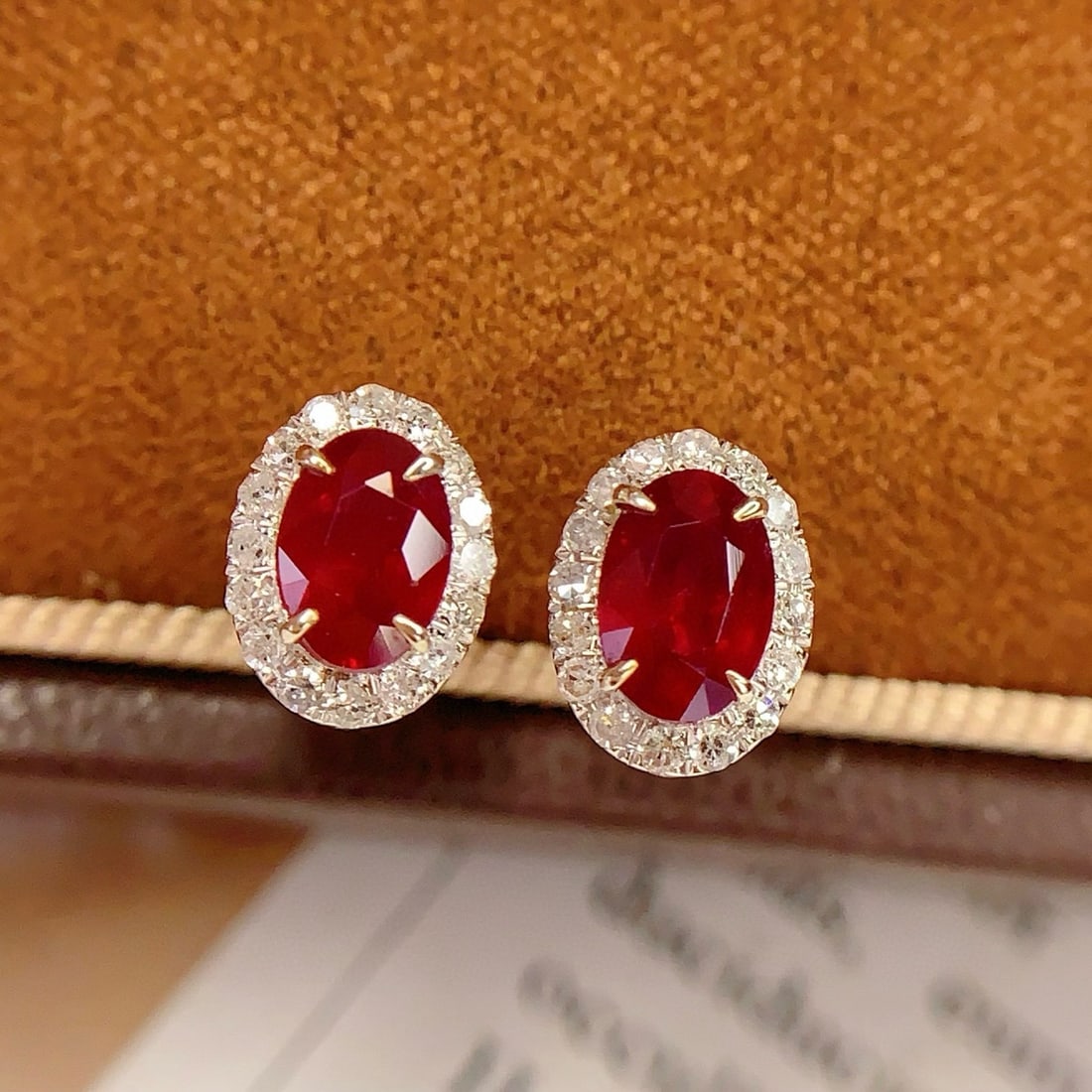 14k Gold 2 Ct Vivid Red Natural Ruby & Diamond Earrings: Ref:231040221 // gold content:14k gold // main gemstone:ruby // shape:oval // carat weight:2ct // color:vivid red // treatment:natural // // adjacent gemstone 2 : diamond // number of stones:34 // sha